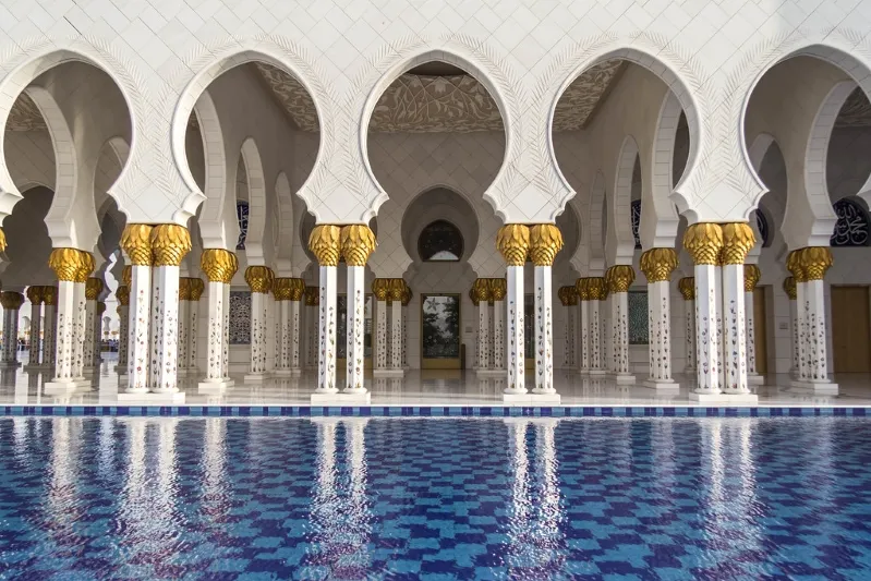 The grand mosque of Abu Dhabi, showcasing stunning architecture and intricate designs, a highlight of the Morocco tour itinerary.
