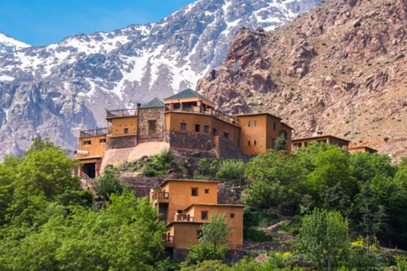 Charming mountain treks in Morocco, set against a breathtaking mountain range, inviting for trekking explorations. 