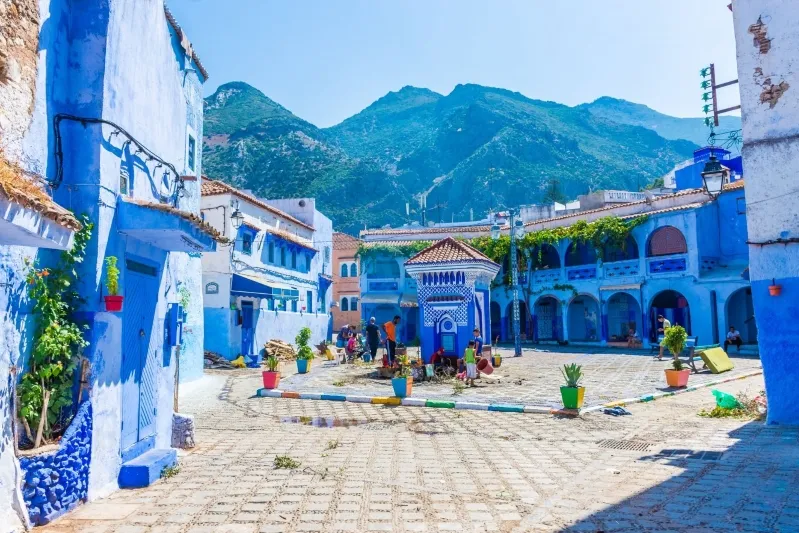 A picturesque landscape of Chefchaouen, Morocco, featuring its famous blue architecture, perfect for exploring on day trips.