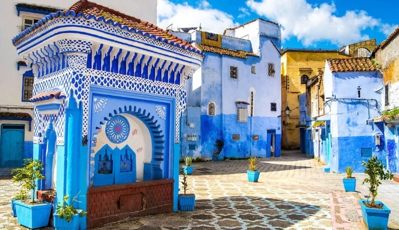 Charming streets of Chefchaouen, Morocco, highlighted by its distinctive blue hues, inviting for chefchaouen day trips adventures.