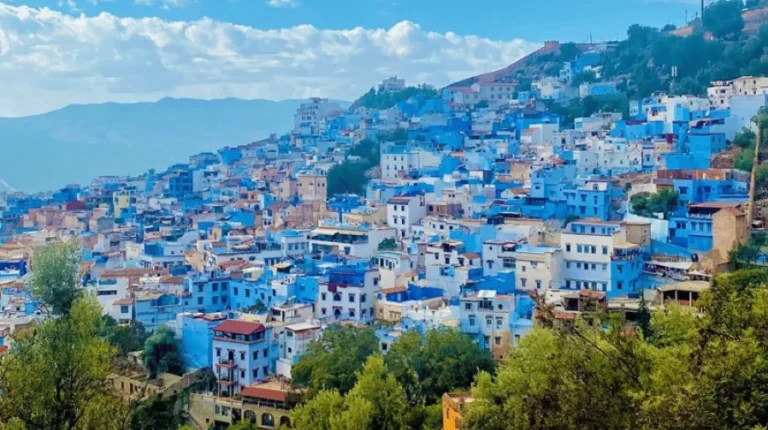 A scenic view of Chefchaouen, Morocco, showcasing its iconic blue buildings, perfect for day trips exploring the blue city.