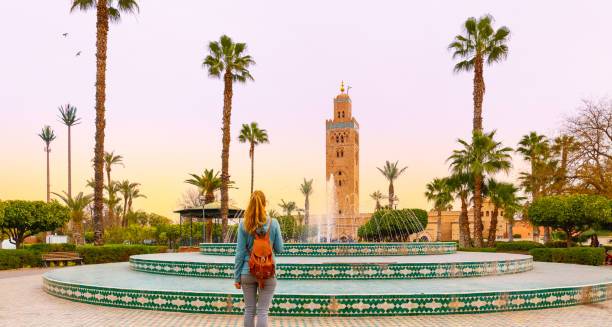 Travelers on a private Morocco tour exploring desert dunes, imperial cities, Atlas Mountains, and cultural landmarks with a private guide