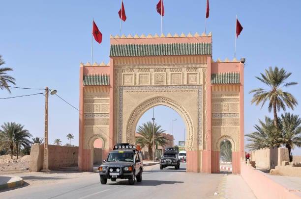 Travelers enjoying an affordable Morocco tour with visits to the Sahara Desert, imperial cities, mountains, and traditional villages
