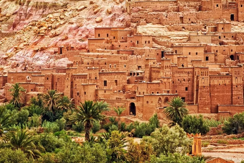 A picturesque view of Morocco's hillside city, showcasing its unique architecture during a trip to Ouarzazate.