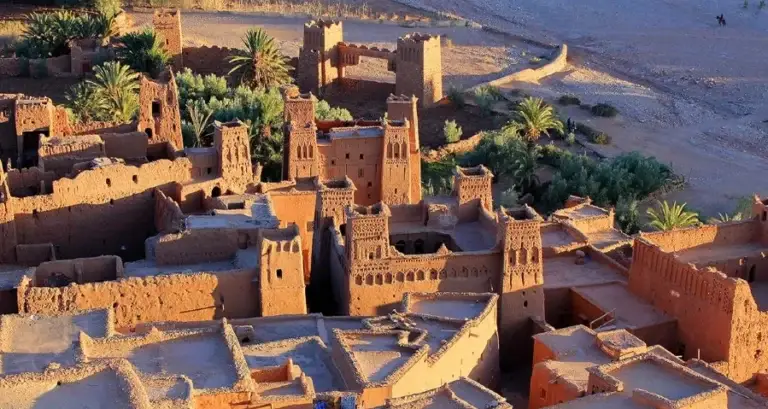 Aerial view of the city of Ouarzazate, Morocco, showcasing its unique architecture and landscape.