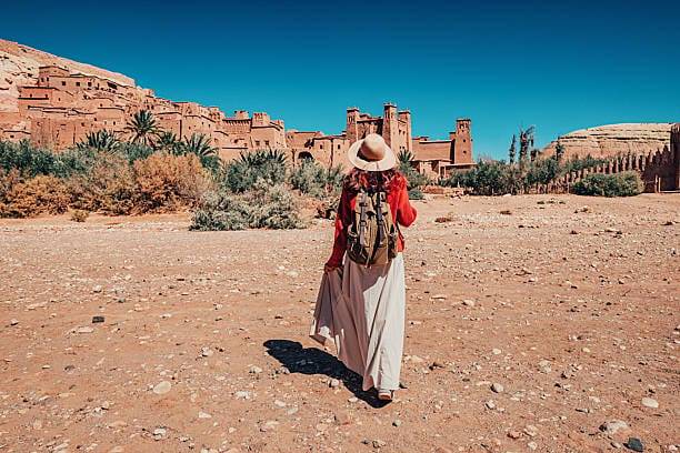 Day trips from Ouarzazate Morocco showing Atlas Film Studios, Aït Benhaddou kasbah, desert landscapes, and Atlas Mountains scenic routes