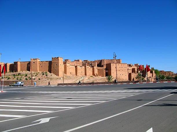 Hotels in Ouarzazate Morocco showing desert resorts, traditional kasbah-style accommodations, Atlas Mountains views, and cinematic landscapes