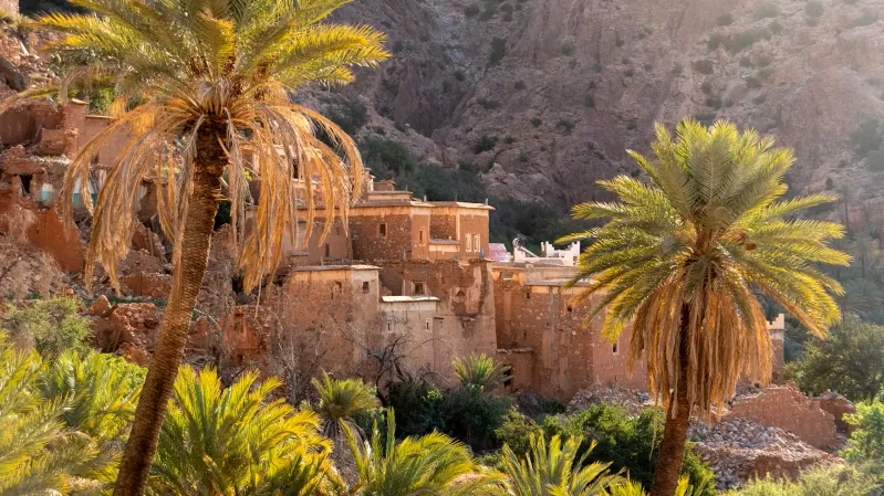 Scenic view of the village of Atlas nestled in the Atlas Mountains, showcasing traditional architecture and natural beauty. 