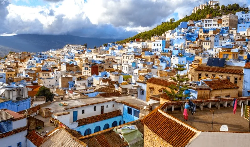 Scenic view of Chefchaouen, Morocco, showcasing its iconic blue buildings, perfect for Morocco vacation packages tours.