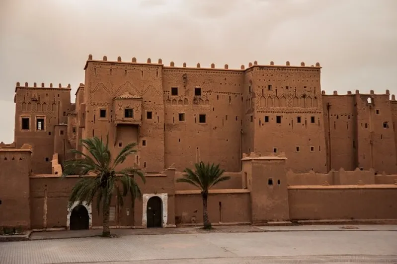 Large castle in Morocco, showcasing its impressive architecture, featured in various Morocco tour packages.