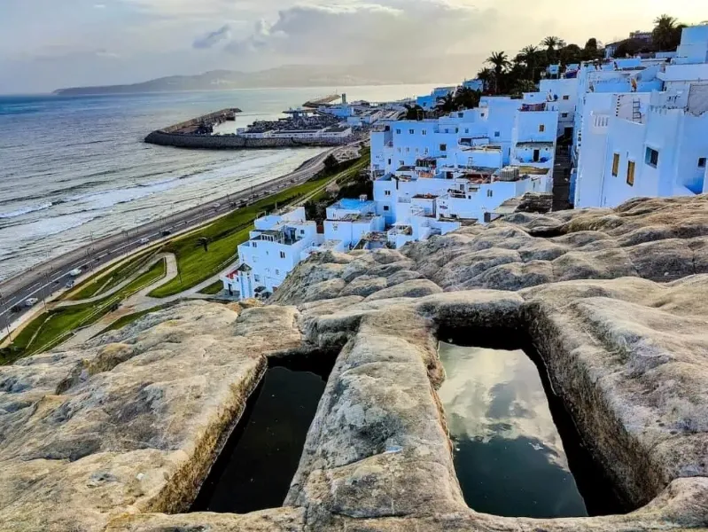 A breathtaking cliffside view of the ocean, highlighting the expansive water and distant horizon.
