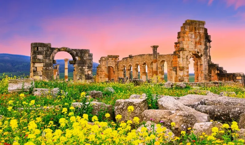 Ruins of the ancient city, showcasing historical architecture with K : best Morocco private tour company