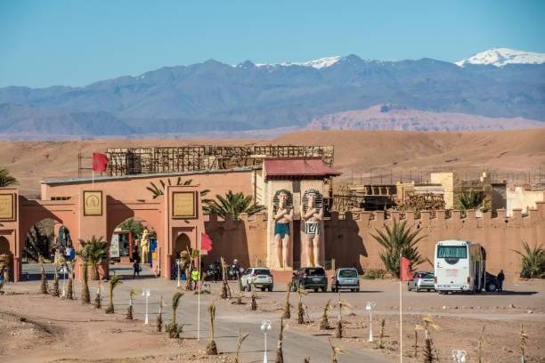 Moroccan adventure featuring Sahara Desert camel trekking, Atlas Mountains, Marrakech medina, and cultural Morocco tours