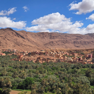 3-day Morocco tour from Marrakech to Fes featuring High Atlas Mountains, Aït Benhaddou, Dades Valley, Todra Gorge, Merzouga Sahara Desert camel trekking, and Ziz Valley