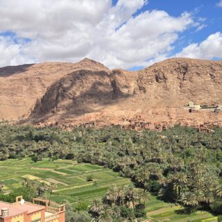 7 days Morocco tour from Tangier featuring Chefchaouen blue city, Fes medina, Sahara Desert camel trekking, Atlas Mountains, and kasbah landscapes