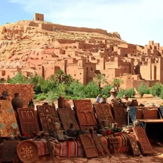 Day trip from Ouarzazate to Ait Ben Haddou and Telouet Kasbah showing desert landscapes and historic ksar architecture