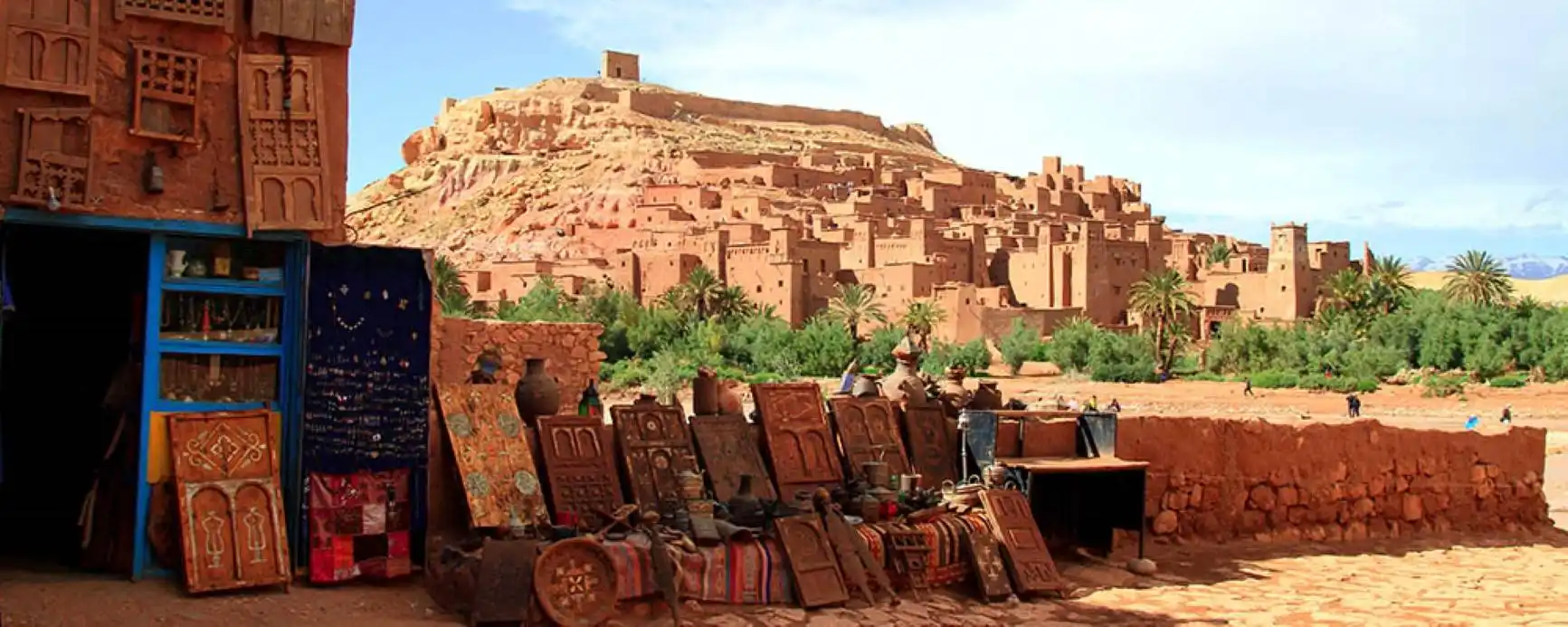 Day trip from Ouarzazate to Ait Ben Haddou and Telouet Kasbah showing desert landscapes and historic ksar architecture