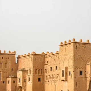 Kasbah Taourirt in Ouarzazate Morocco showing historic clay architecture and desert fortress style building