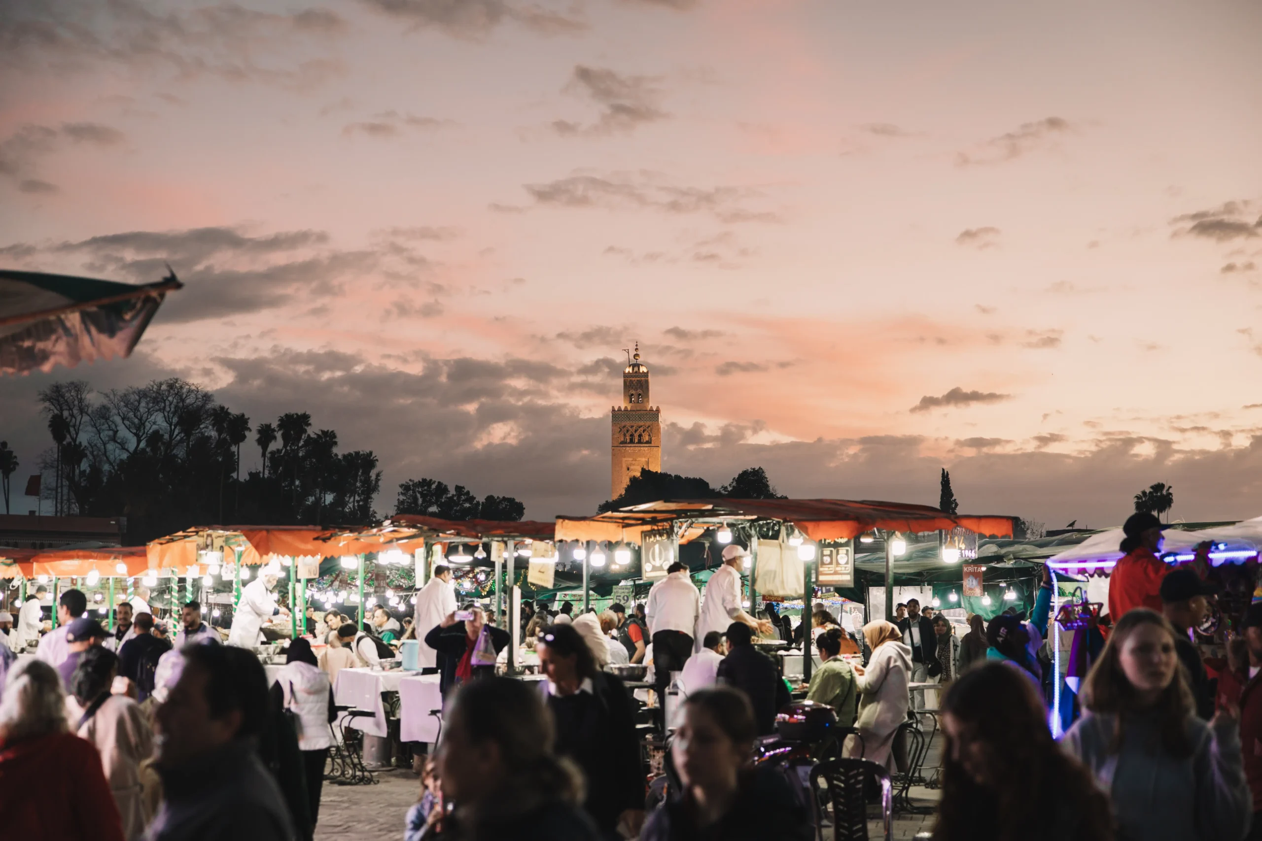 Traveling to Morocco from Europe showing airplane arrival, Casablanca airport, Marrakech medina, and Sahara Desert tours