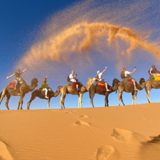 5 day Morocco desert tour from Marrakech to Merzouga featuring High Atlas Mountains, Aït Benhaddou, Dades Valley, Todra Gorge, and Sahara camel trekking in Erg Chebbi