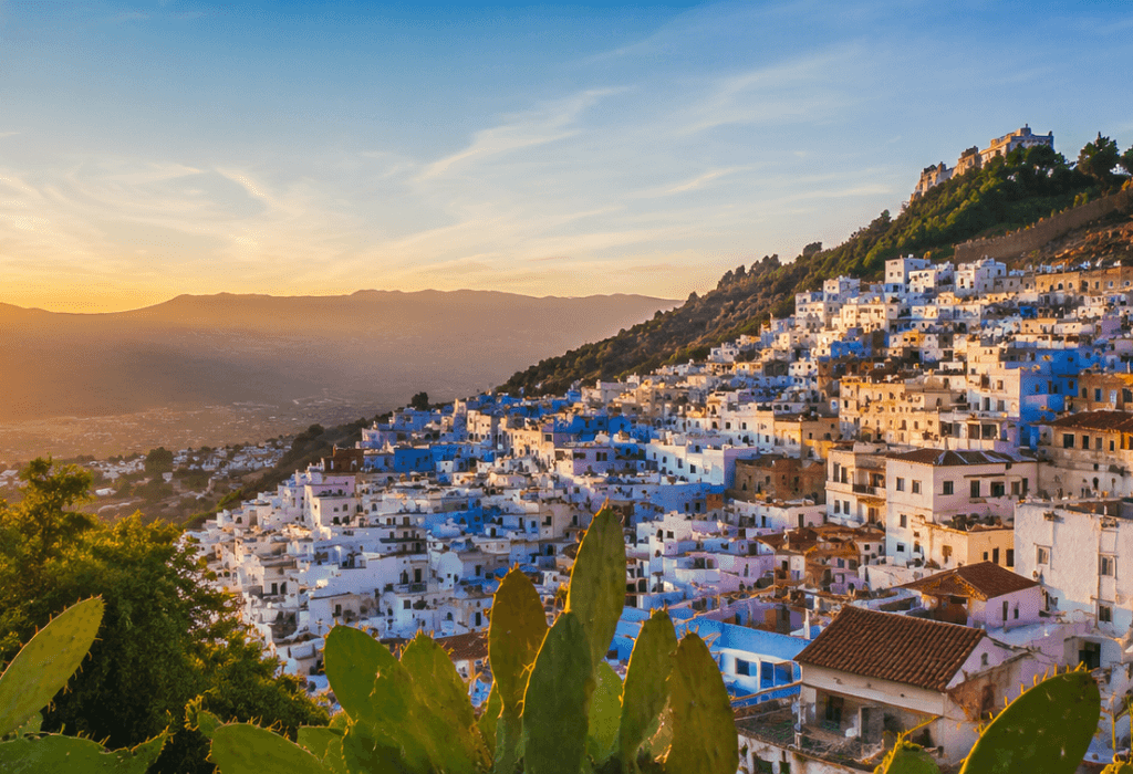 Scenic Morocco landscape featuring the Sahara Desert, Atlas Mountains, traditional kasbahs, and historic imperial cities
